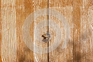 The retro padlock on wooden door in countryside, concept of secu