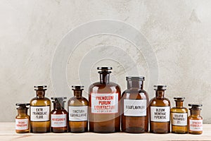 Retro pharmacy - vintage pharmacy bottles on wooden board