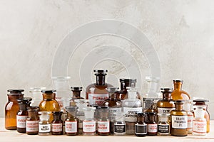 Retro pharmacy - vintage pharmacy bottles on wooden board