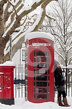 Retro phone booth in the snow