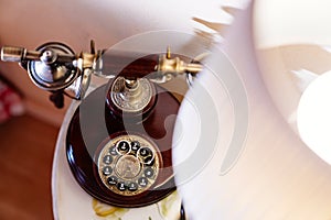 Retro phone with dial and wedding rings