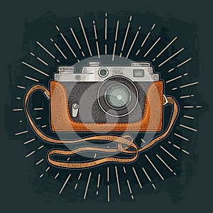 Retro photo camera with ray. Vector illustration