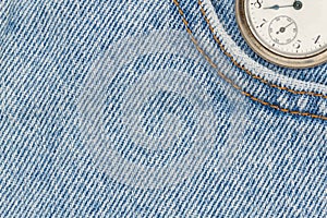 Retro pocket watch with blue jeans denim material