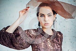 Retro portrait of a beautiful woman. Vintage style. Fashion photo