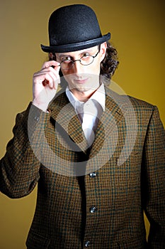 Retro portrait of english gentleman in bowler hat