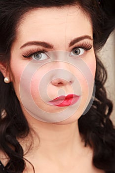 Retro. Portrait of woman girl with pinup hairstyle