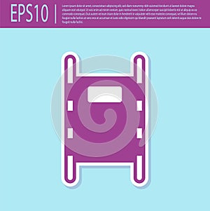 Retro purple Stretcher icon isolated on turquoise background. Patient hospital medical stretcher. Vector Illustration