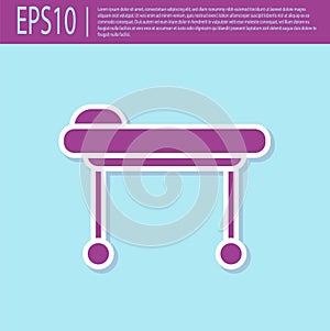 Retro purple Stretcher icon isolated on turquoise background. Patient hospital medical stretcher. Vector Illustration
