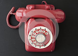 Retro red desktop telephone