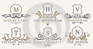 Retro Royal Vintage Shields Logotype set. Vector calligraphyc Luxury logo design elements. Business signs, logos