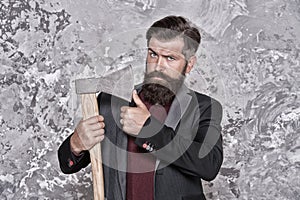 Retro shaving. Bearded man hold sharp axe. Retro razor blade. Brutal hipster abstract background. Retro barbershop