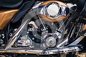 Retro shiny chrome motorcycle engine image.