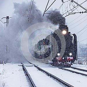 Retro steam train departs