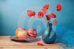 Retro still life with poppies and apples