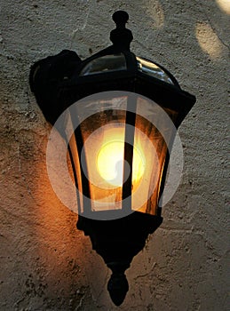 Retro street wall lamp with yellow orange light