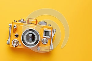 Retro style camera isolated on yellow background, ai generated