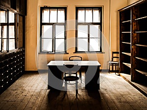 Retro style office room with wooden table, old chairs and cabinets. Vintage theme