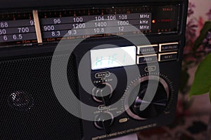 Retro style radio for FM and AM radio reception. Can also listen to MP3 files. Details and close-up.