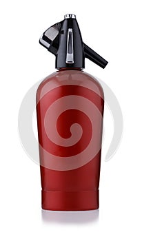 A retro style red metal soda siphon, isolated on white