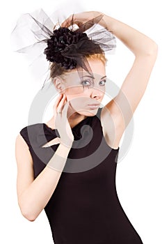 Retro style woman in black dress and hat