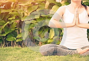 Retro style woman yoga with lotus hands in soft focus background