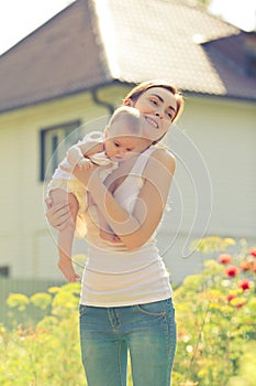 Picture of woman holding baby on arms