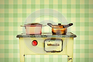 Retro styled image of a doll house cooking stove