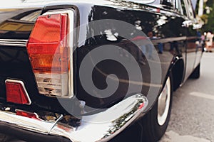 Retro styled image of a front of a classic car.