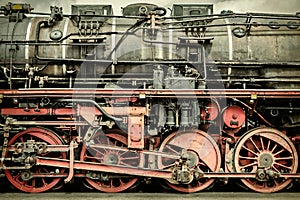 Retro styled image of an old steam locomotive photo