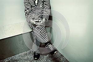 Retro styled image of a prisoner inside a prison