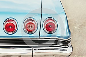 Rear end of a blue classic car