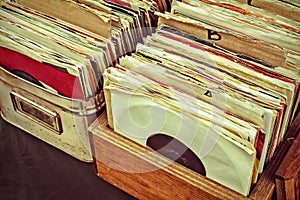Retro styled image of vinyl lp records on a flee market