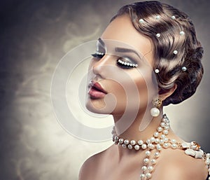 Retro styled makeup with pearls