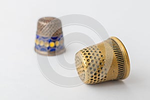 Retro styled sewing thimbles, close-up