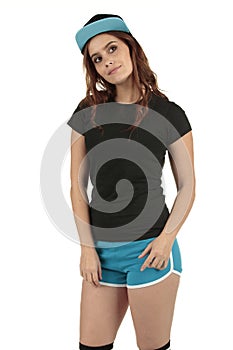 Retro styled sports model wearing a blank black t-shirt and blue running shorts teamed up with a baseball cap