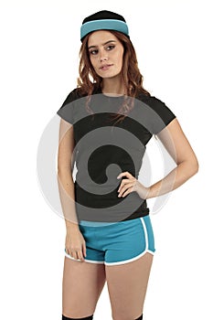 Retro styled sports model wearing a blank black t-shirt and blue running shorts teamed up with a baseball cap