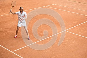 retro styled tennis player with racket