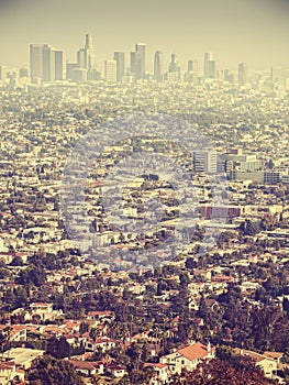 Retro stylized aerial view of Los Angeles seen through smog, USA