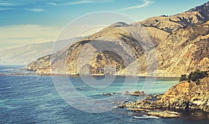 Retro stylized California coastline along Pacific Coast Highway