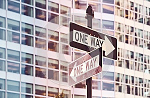 Retro stylized picture of one way street signs in New York