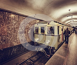 Retro subway train of A series stands by the platform