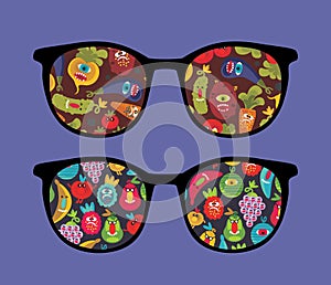 Retro sunglasses with monsters reflection in it.