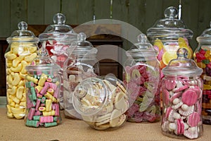 retro sweets or candy in glass jars