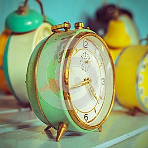 Retro syled image of ancient alarm clocks