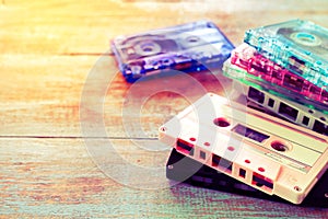 Retro tape cassette over wooden table