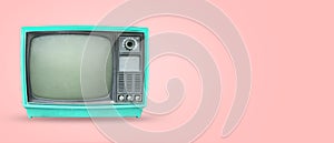 Old vintage tv on pastel color background. photo