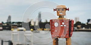 Retro tin robot toy city background Concept