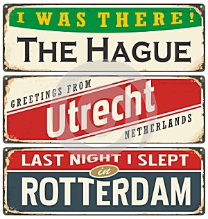 Retro tin sign collection with Netherlands city names