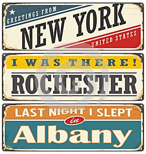 Retro tin sign collection with USA city names