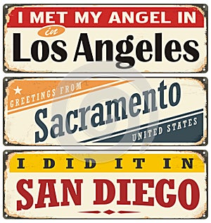 Retro tin sign collection with USA city names